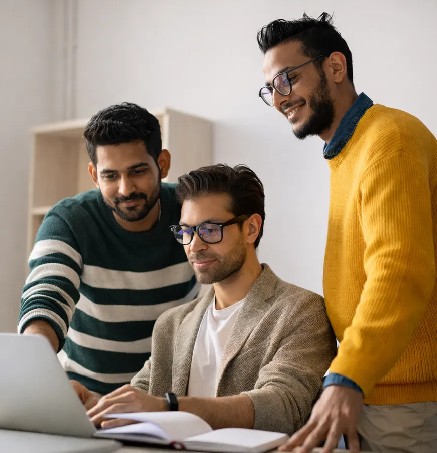 Genifai technology team collaborating on AI solutions